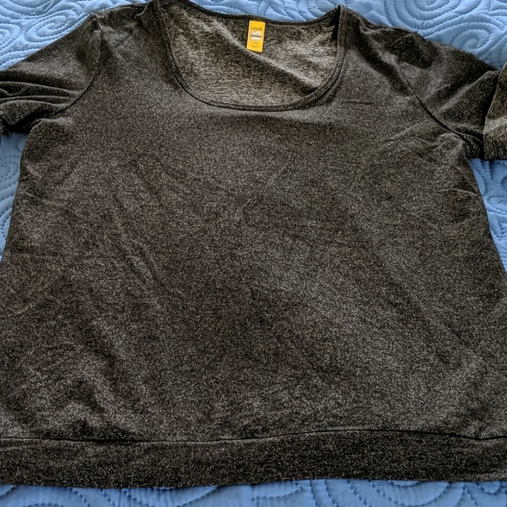 Very cute Lole tee. More like a medium.